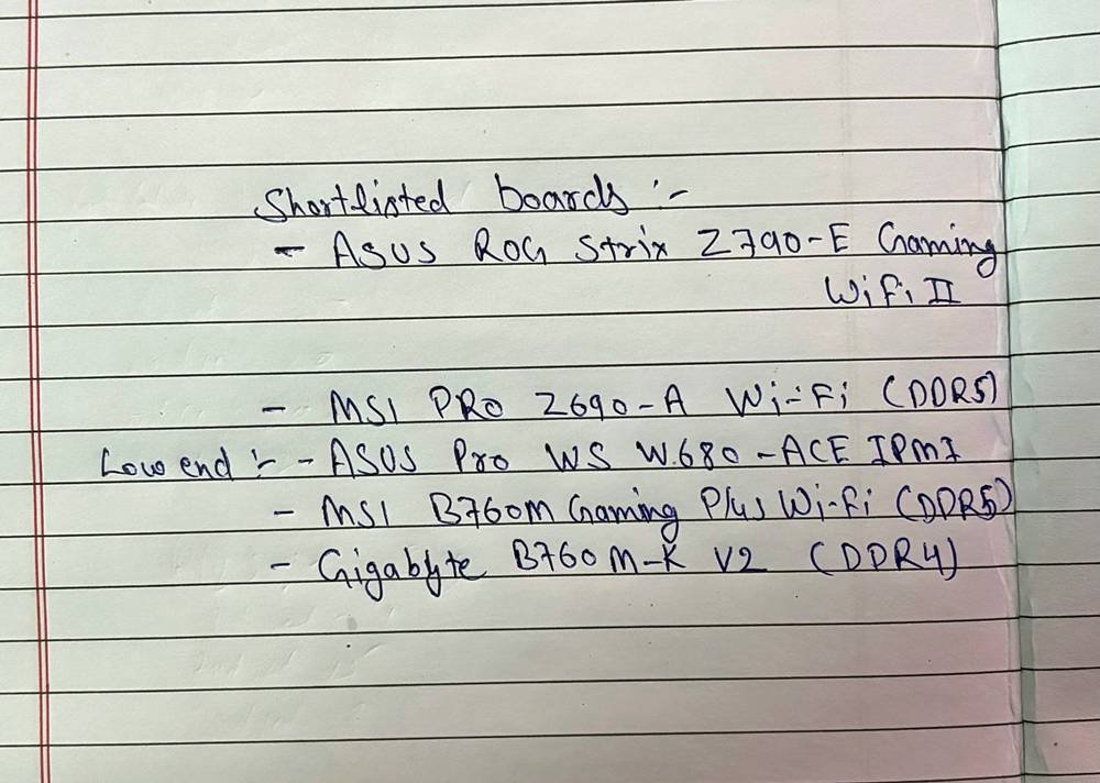 a handwritten list of shortlisted motherboards