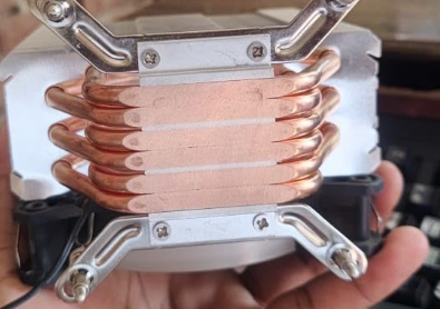 checking cpu cooler's cold plate for the plastic film